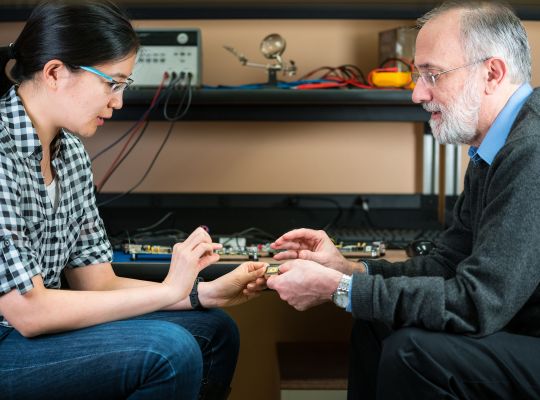 Joel Emer and Vivienne Sze working in lab