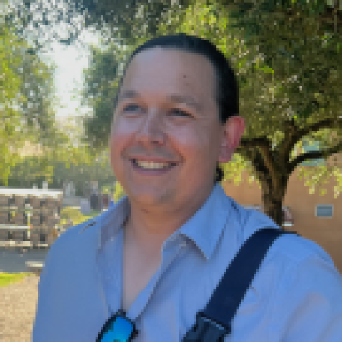 photo of Dylan Hadfield-Menell in front of tree