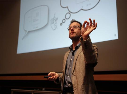 Photo of Roger Levy giving talk