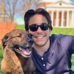 Mike Ferguson on UVA campus with a tawny dog